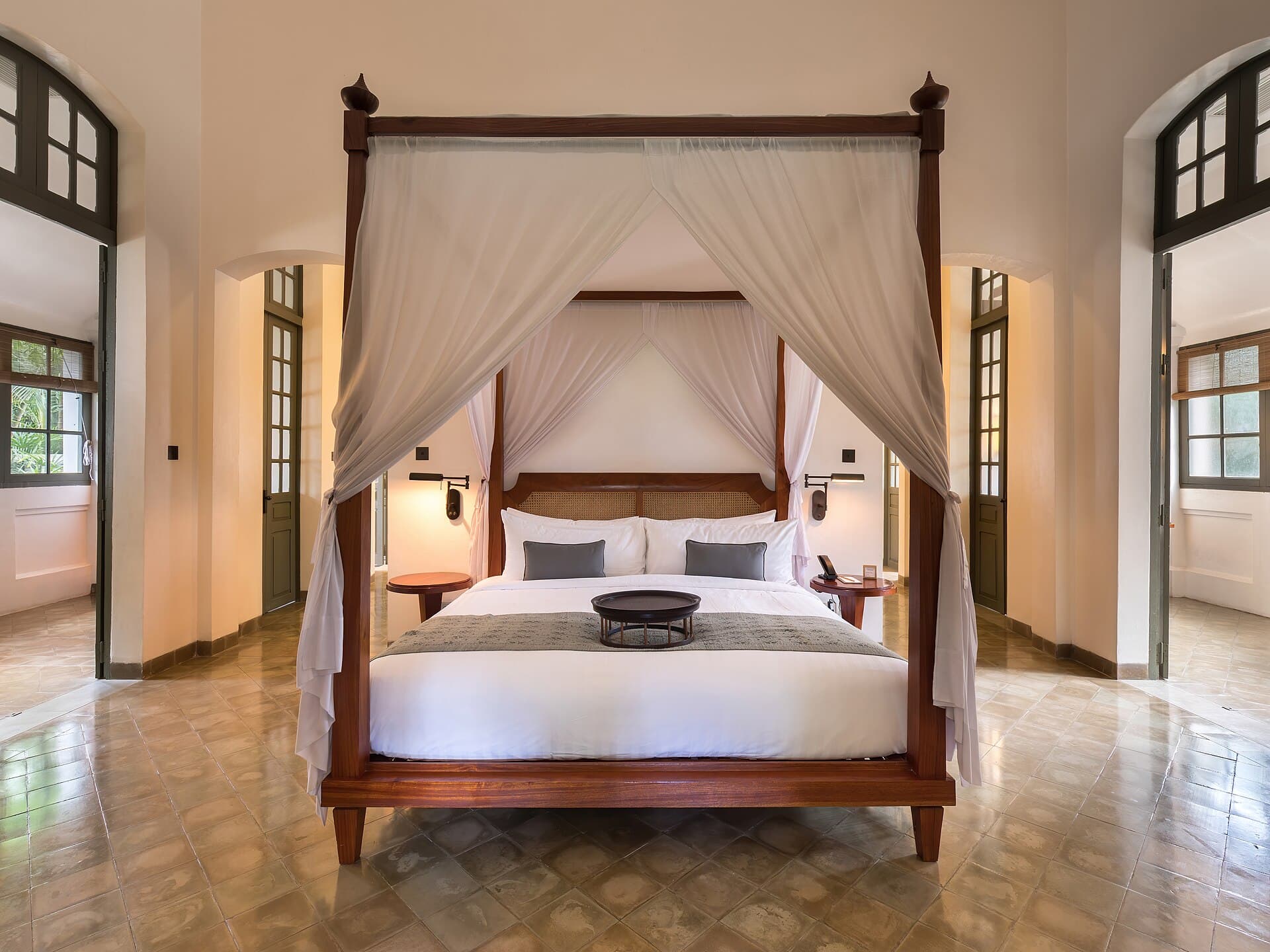 Hotel suite bedroom with soft lighting